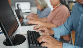 cropped-image-seniors-attending-computer-600nw-2370556345