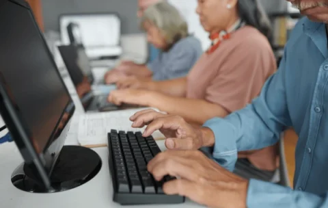 cropped-image-seniors-attending-computer-600nw-2370556345