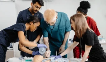 diverse-group-medical-students-practicing-600nw-2656738411