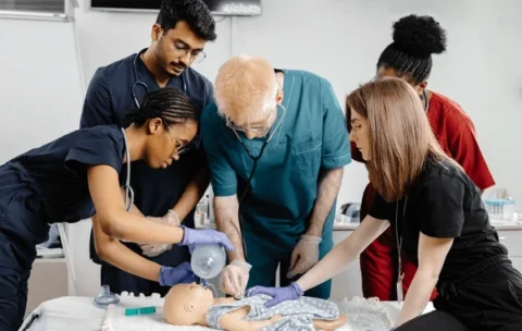 diverse-group-medical-students-practicing-600nw-2656738411