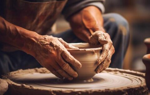 generative-ai-hands-with-clay-making-of-a-ceramic-pot-in-the-pottery-studio-hobby-and-leisure-concept-photo