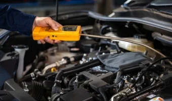 mechanic-hand-check-leaks-gas-260nw-1653892660